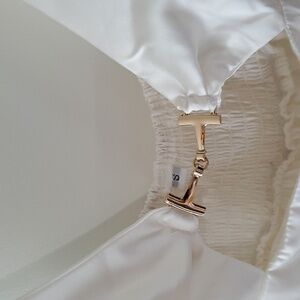 White satiny smocked back gold detail mini dress S